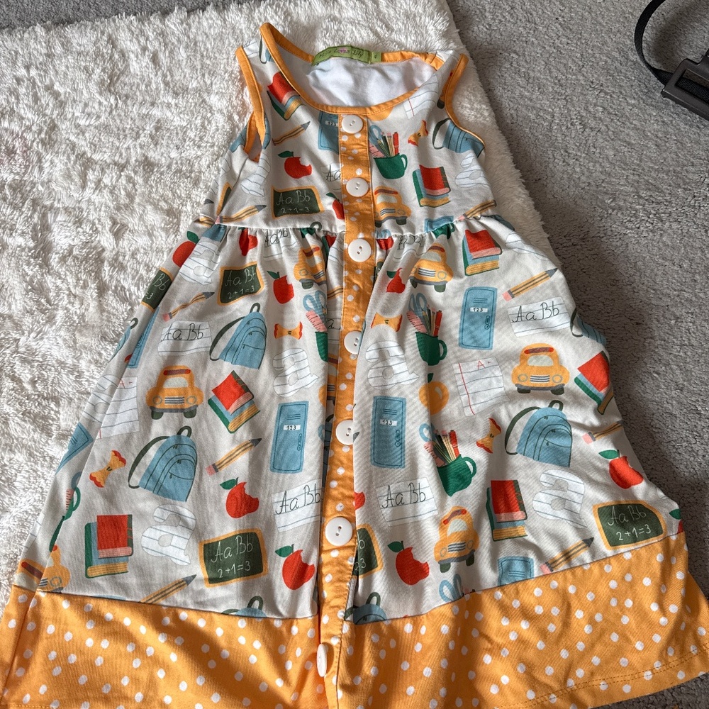 Brand new girls school themed dress size 4